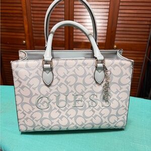 GUESS Pale blue and off white Signature Satchel